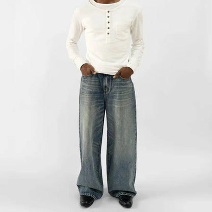 Wide-Leg Blue Denim Jeans with Faded Vintage Wash and Whiskering