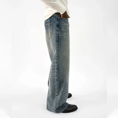 Wide-Leg Blue Denim Jeans with Faded Vintage Wash and Whiskering