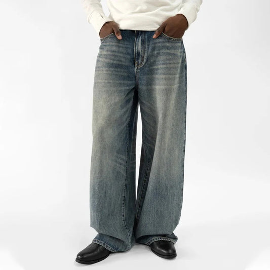 Wide-Leg Blue Denim Jeans with Faded Vintage Wash and Whiskering