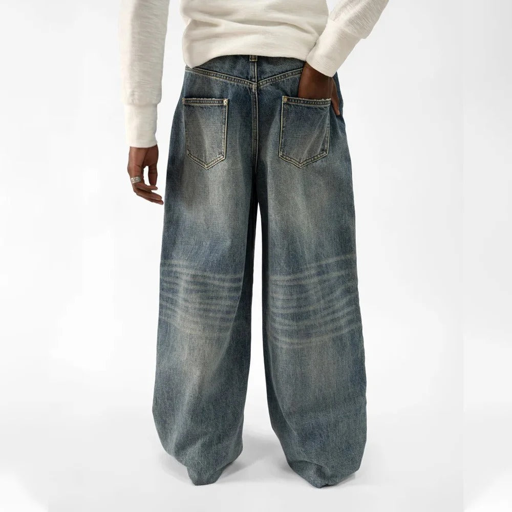 Wide-Leg Blue Denim Jeans with Faded Vintage Wash and Whiskering