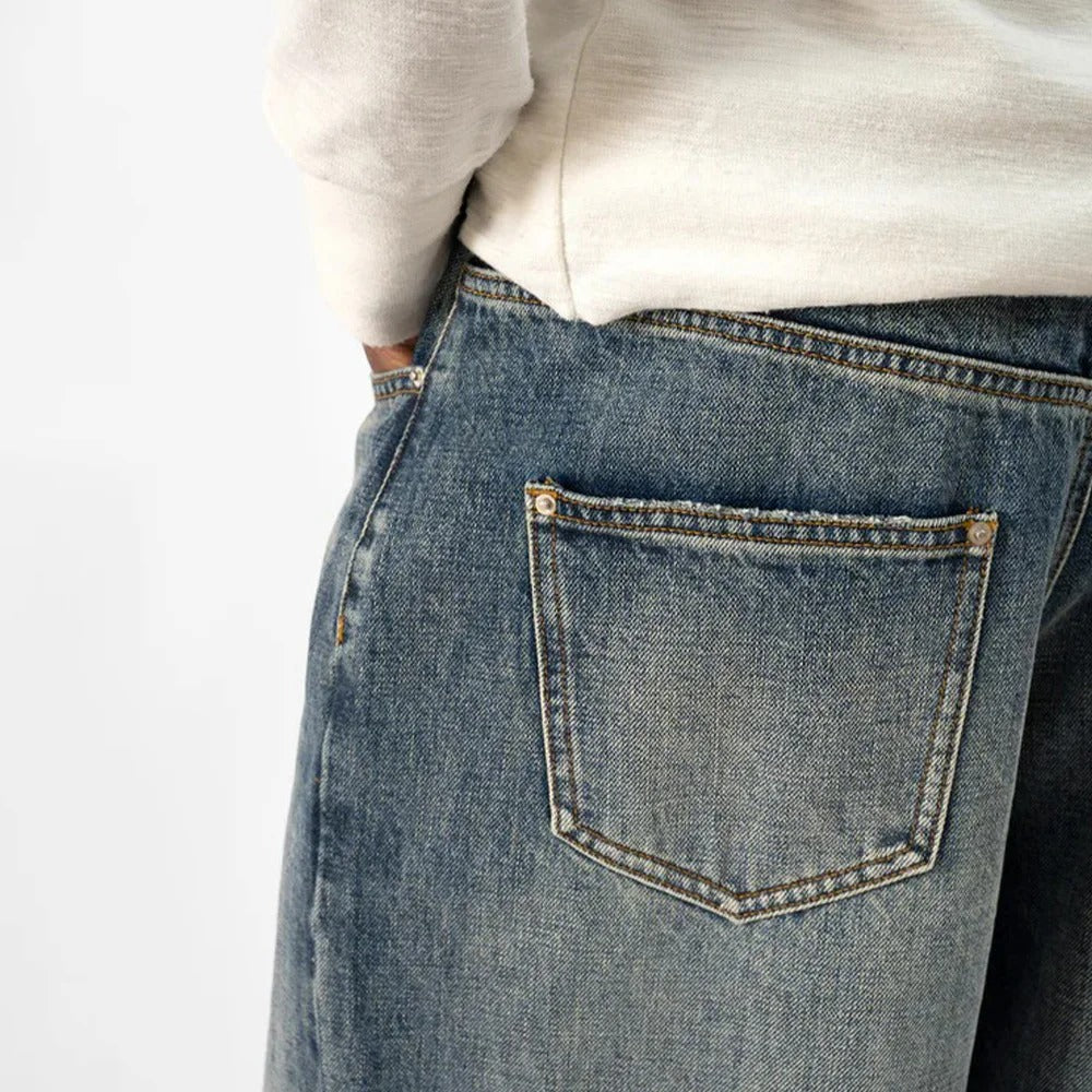 Wide-Leg Blue Denim Jeans with Faded Vintage Wash and Whiskering