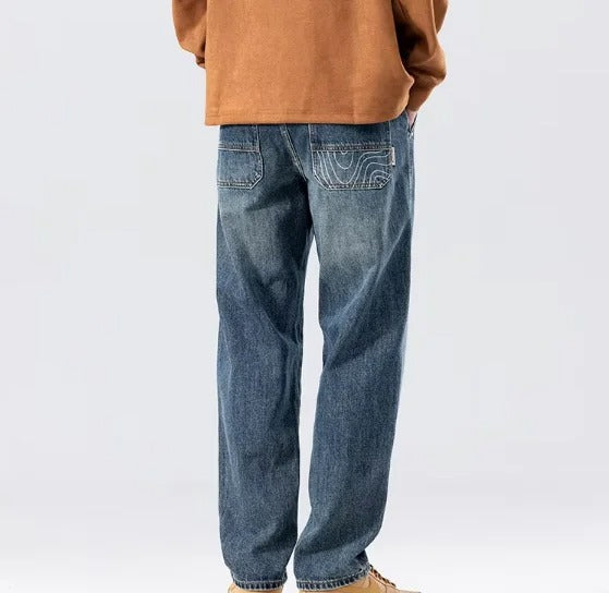 Straight-Leg Blue Denim Jeans with Faded Wash and Flap Back Pocket